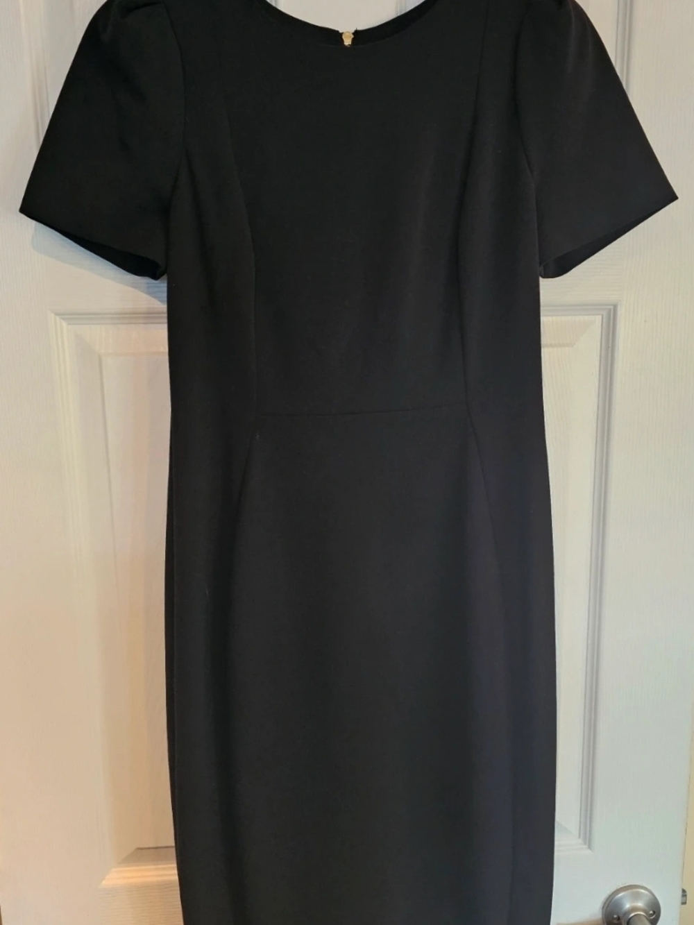 Ladies Black Calvin Klein Tulip Sleeve Knee Length Dress. Size: 8